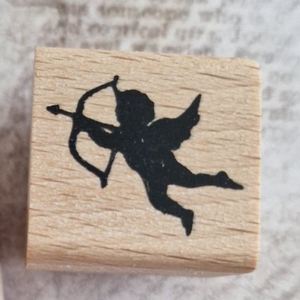 RAZÍTKO gumové na dřevě (letící amorek)