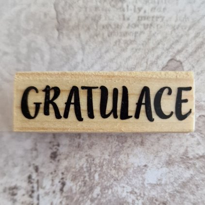 RAZÍTKO gumové na dřevě (text: GRATULACE)
