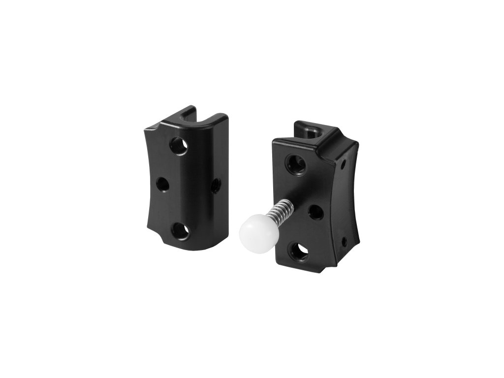 Pohľad na predný a zadný fixačný blok s viditeľným profilovaním pre presné usadenie na vodiace lišty.