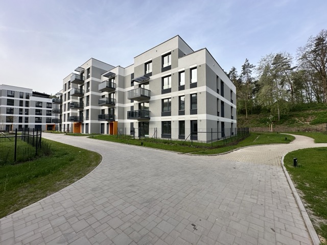 Invisible access panels in the facade of a residential project