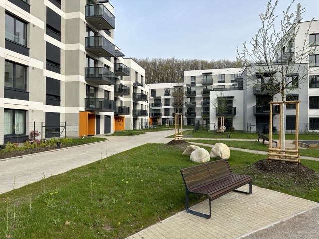 Invisible access panels in the facade of a residential project