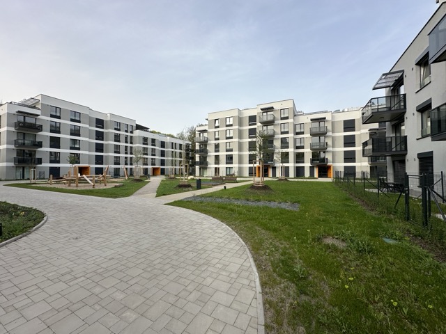 Invisible access panels in the facade of a residential project