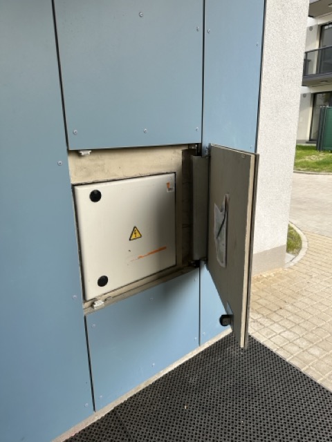 Invisible access panels in the facade of a residential project
