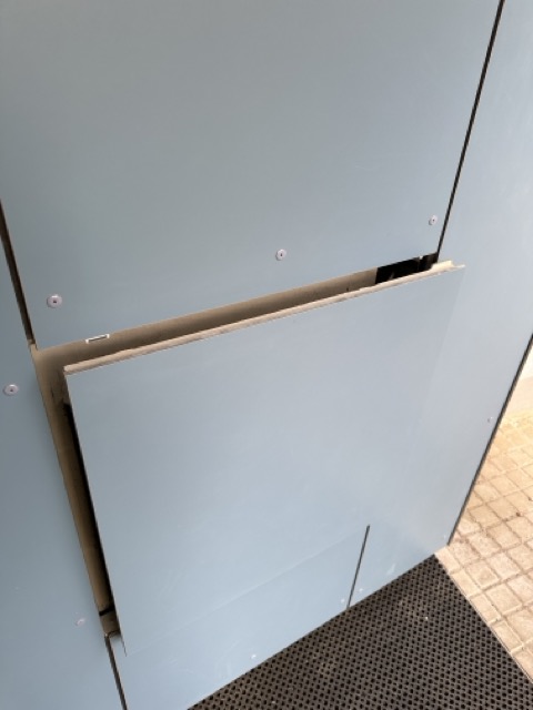 Invisible access panels in the facade of a residential project
