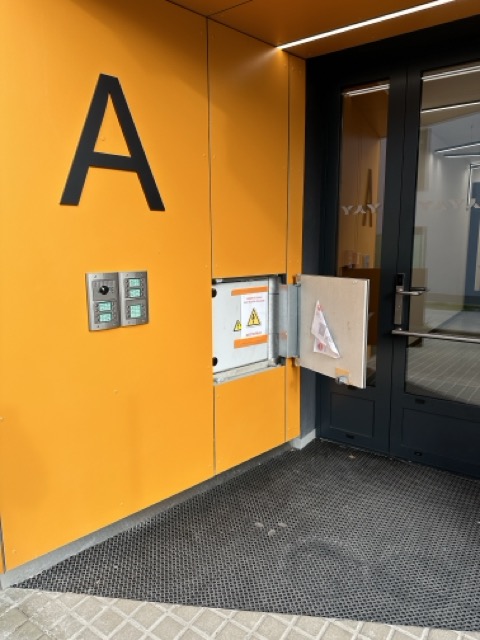 Invisible access panels in the facade of a residential project
