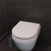 WC prkénko v bílé barvě ve tvaru U