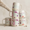 Firefly Professional studio product mockup of multiple ceramic mugs stacked and arranged toge 418049