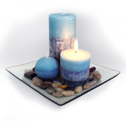 Gift set of 3 blueberry scented candles on a glass tray with stones.