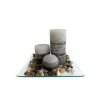 Gift set of 3 candles with jasmine scent on a glass tray with stones