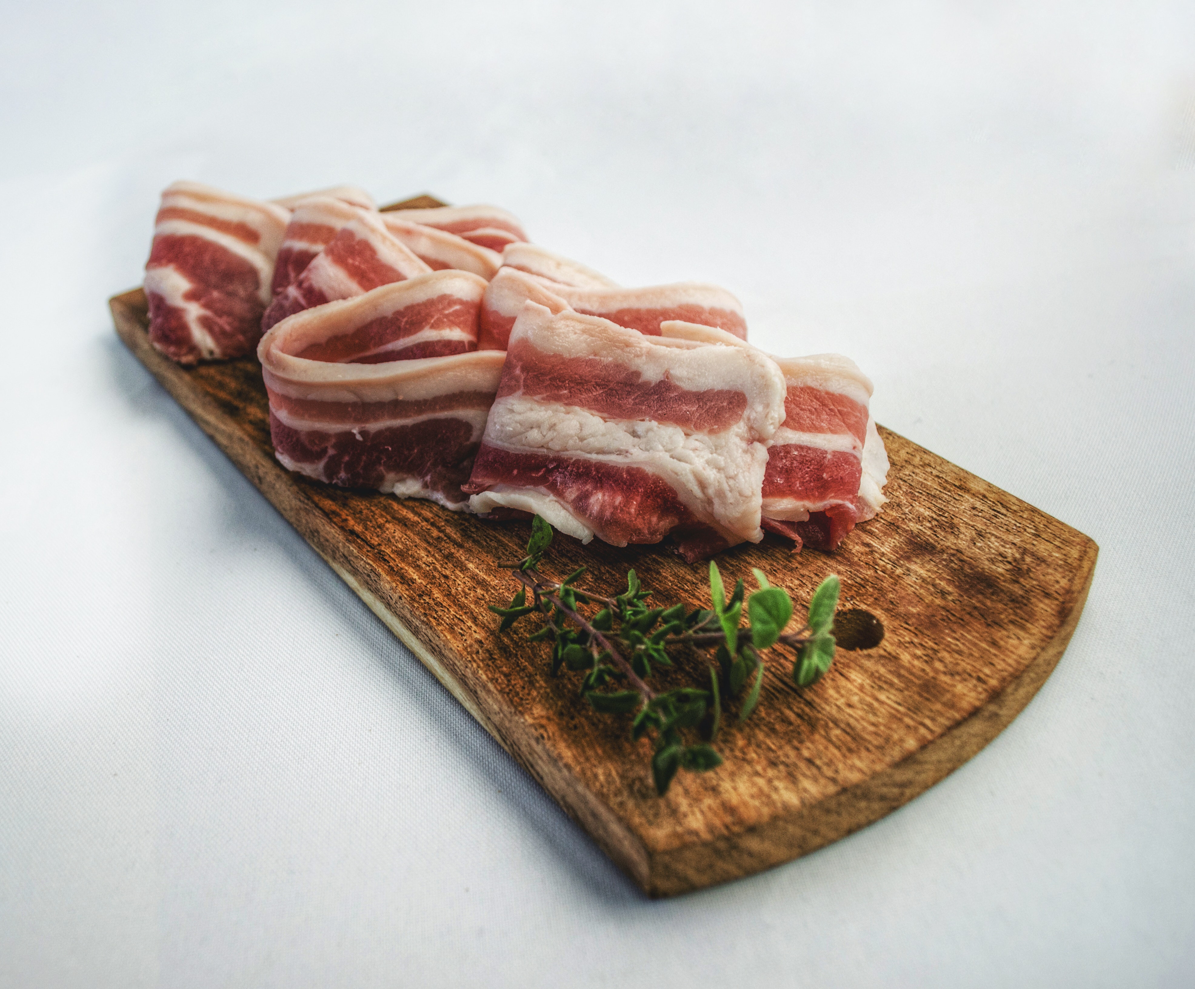 food-photography-of-sliced-bacon-on-top-of-brown-chopping-1927377