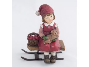 Zimní děvčátko na saních
