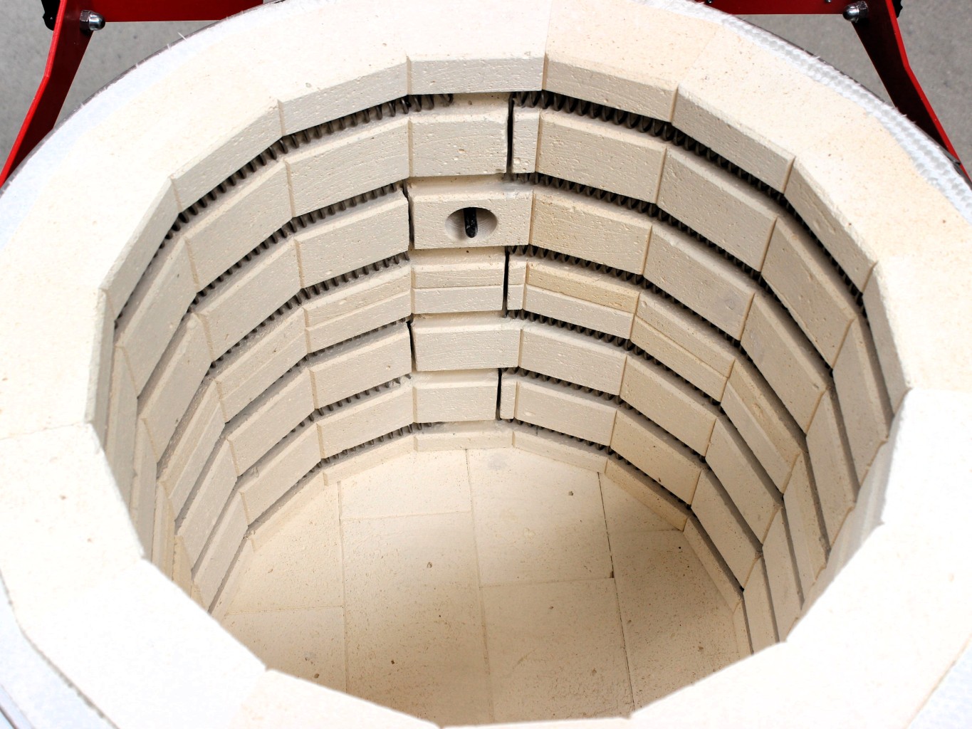 Interior of a LAC top-loading ceramic kiln with heating elements