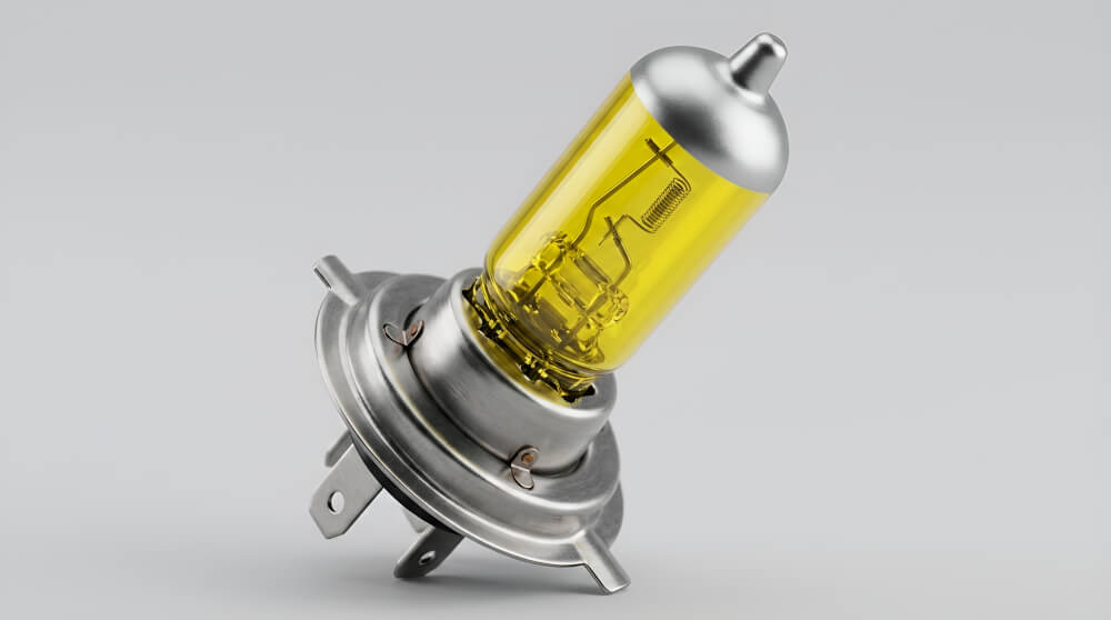 Vista dettagliata del bulbo in vetro tinteggiato di giallo della lampadina Ledson H7 24V 70W