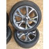 Sada 4 alu disků 7Jx18H2 ET47,5 4x108 H1BJ-1007-E1A 4x pneu PIRELLI Cinturato P7 215/45 18 originál FORD