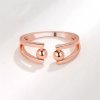 Antistresový prsten s 2 kuličkami v barvě růžového zlata  nastavitelná velikost, nerezová ocel