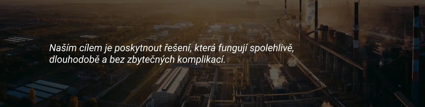 Banner se sloganem a továrnou