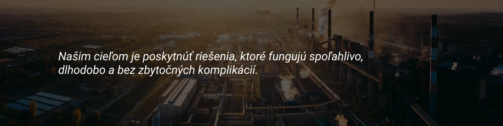 Banner se sloganem a továrnou