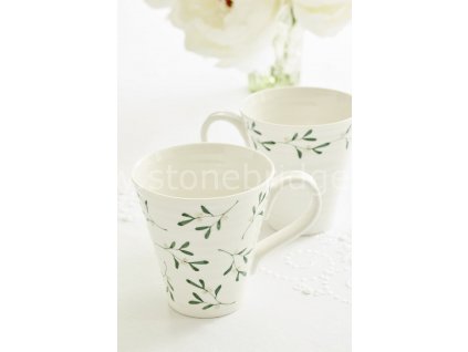 sophie conran mistletoe two mugs on table cloth with white roses 2019