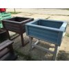 03 ea. Flower pot on legs, coloured
