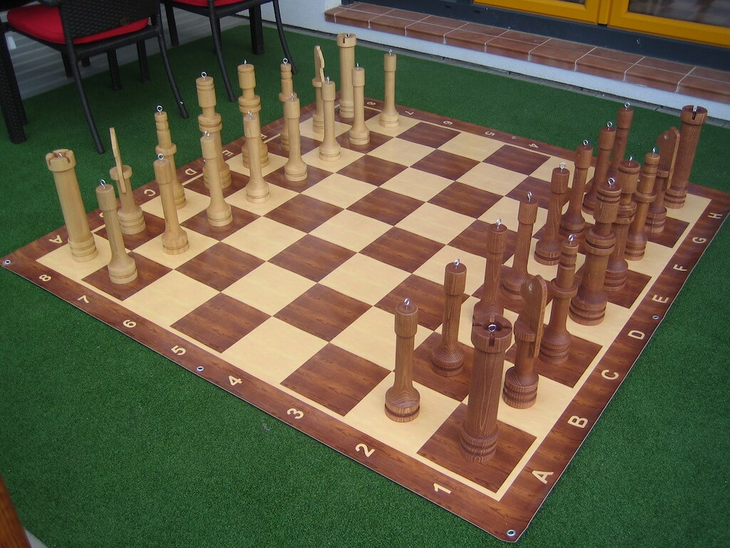 Zahradní šachy velké Hra +: banner (180x180cm)
