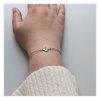 Jemný zlatý náramek nožičky