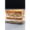tuna sandwich with mayo vegetables gray stone background