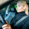 60a82c0e2c2e01f2a39c4381 side view elder business woman driving car2 p 1080