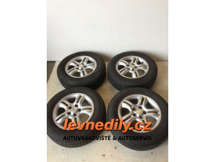 Alu Sada Kol Kia 6,5JX16 ET 41 5X114,3 Střed 67,1MM S pneu Kormoran