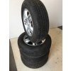 Alu Sada Kol Kia 6,5JX16 ET 41 5X114,3 Střed 67,1MM S pneu Kormoran