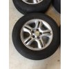 Alu Sada Kol Kia 6,5JX16 ET 41 5X114,3 Střed 67,1MM S pneu Kormoran