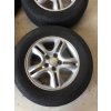 Alu Sada Kol Kia 6,5JX16 ET 41 5X114,3 Střed 67,1MM S pneu Kormoran