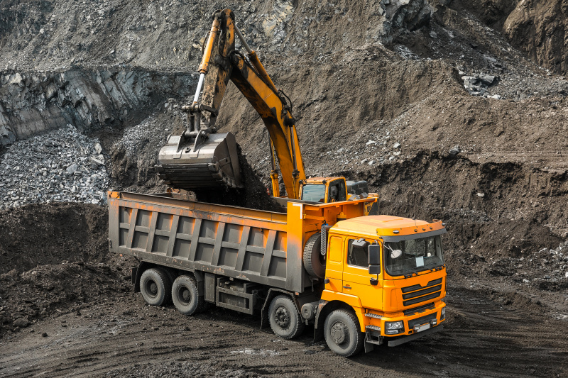 bigstock-Large-Quarry-Dump-Truck-Loadi-251429137