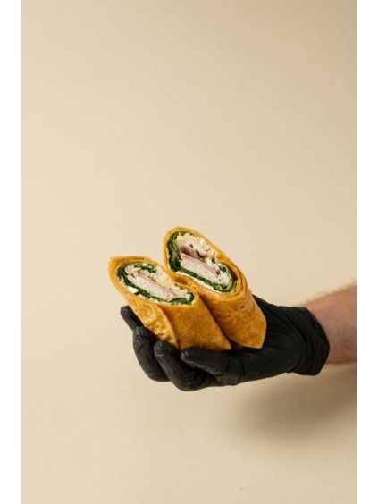 Tortilla wrap with chicken and Caesar salad