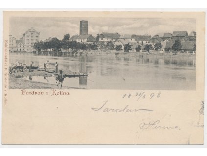 29 - Kolín, oživená partie u řeky s pohledem na město, cca 1898