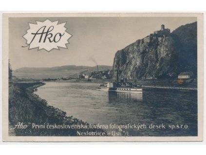 69 - Ústí nad Labem, zřícenina hradu Střekov, parník na řece, pohlednice s reklamním přítiskem továrny "Ako", cca 1935