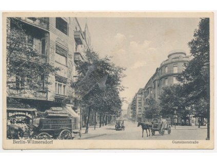 Německo, Berlín, Wilmersdorf, Gasteinerstrasse, oživená ulice, koňský povoz..., 1943