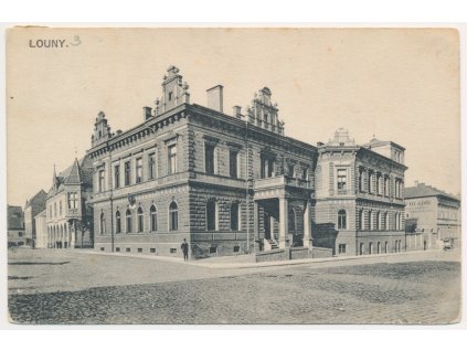 34 - Louny, oživená partie před C. k. poštou, cca 1919