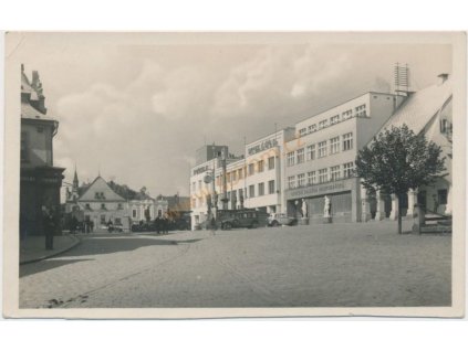 22 - Jičínsko, Nová Paka, oživené náměstí, Grafo Čuda, cca 1913
