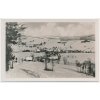 57 - Rychnovsko, Deštné v Orlických horách, pohled na obec v zimě, cca 1934