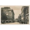 34 - Louny, oživená Pražská ulice s obchody, cca 1935