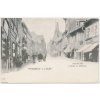 34 - Louny, oživená Pražská ulice, chrám sv. Mikuláše, cca 1909