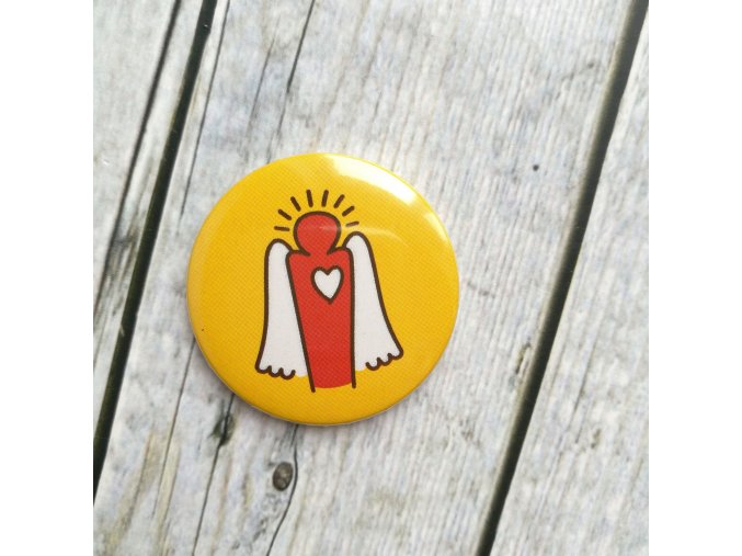 Žlutá kulatá magnetka s logem Dobrý anděl