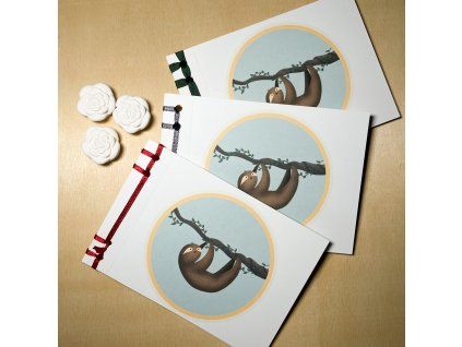 Tři sešity s lenochodem