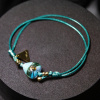 Náramek Turquoise Whisper Turquoise s 24karátovým zlatem v perle Lampglas