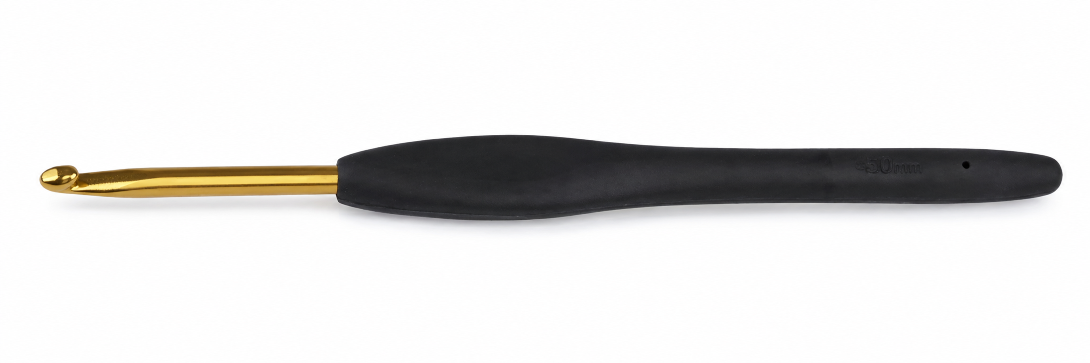 Černý ergonomický háček se zlatou špičkou položený vodorovně