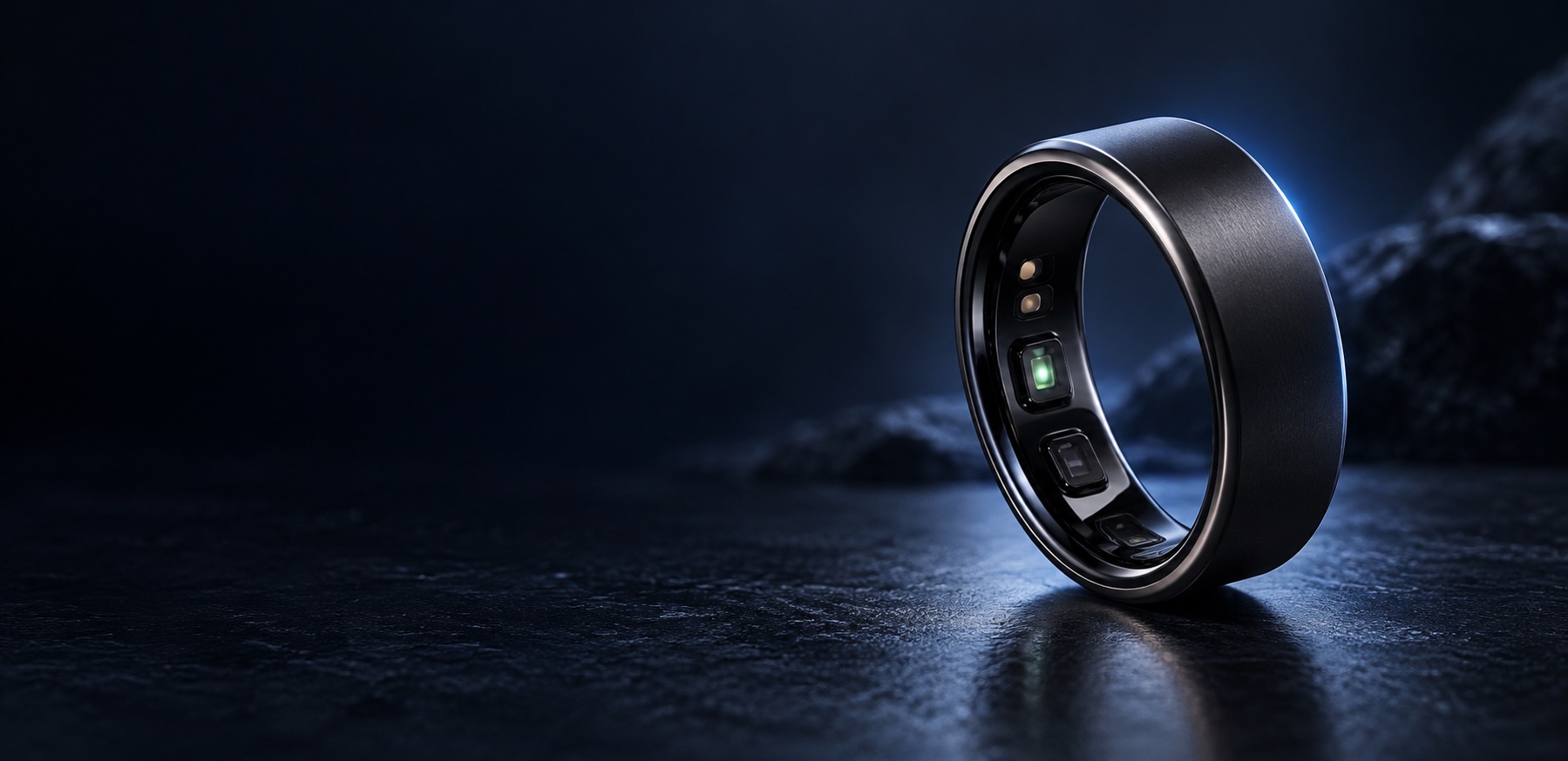 Illustrative smart ring on a dark background