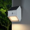 Biele LED fasádne solárne LED svietidlo s pohybovým čidlom 2,5W IP65 CCT