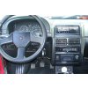 PEUGEOT 106 interier s vestavenym rameckem a neoriginalnim autoradiem
