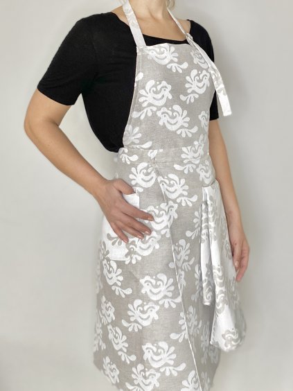 Elegant linen kitchen apron with jacquard folk pattern