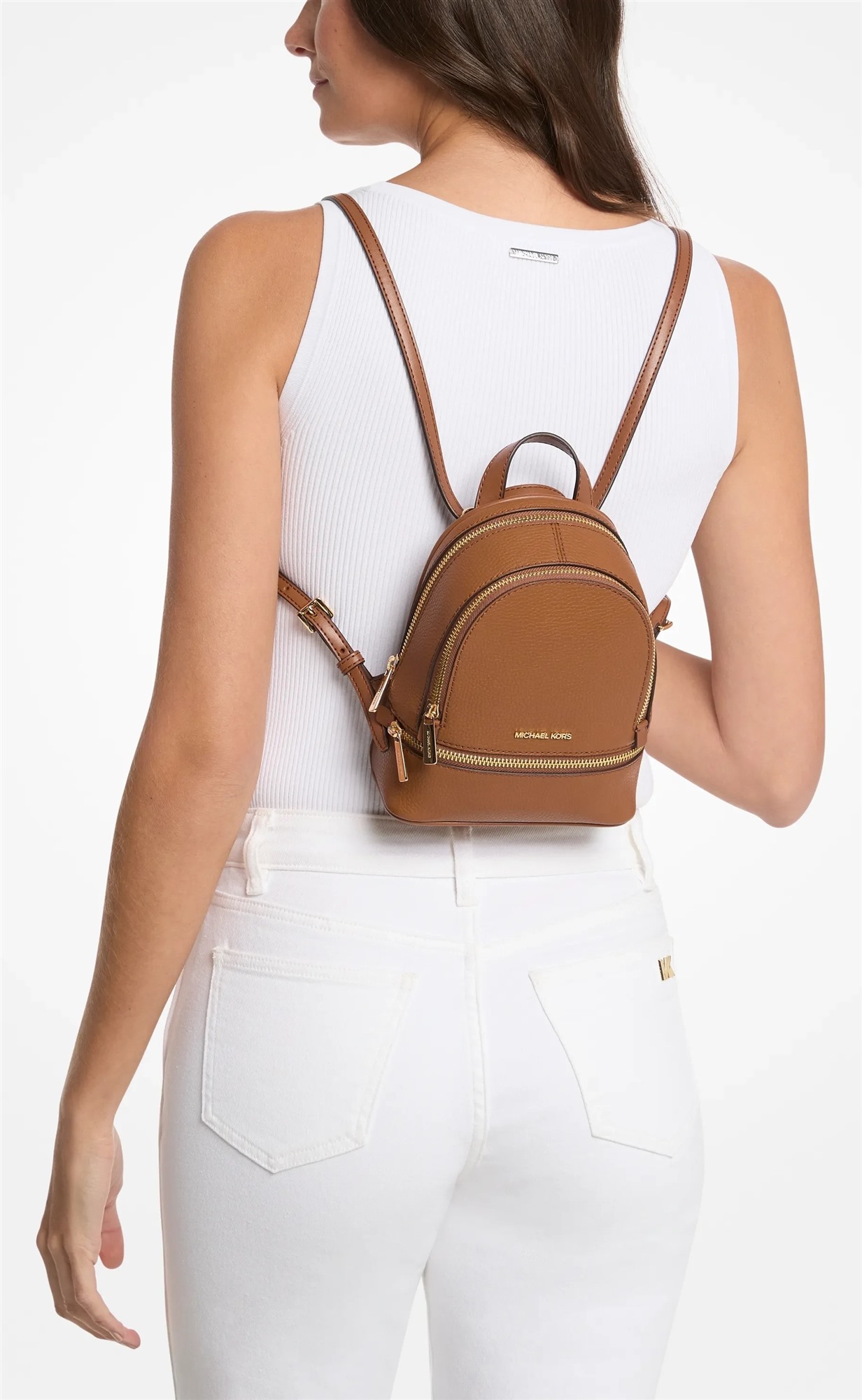 Michael Kors Rhea Extra-Small kožený dámský batoh luggage zlatý na zádech